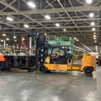 CCI Industrial Constructors - Forklift in action: transporting equipment within an industrial facility.