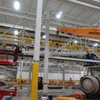 CCI Industrial Constructors - A large building with a crane and machinery.