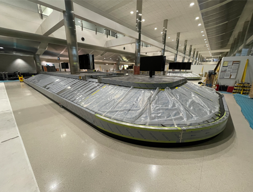 CCI Industrial Constructors - Baggage claim area under construction, temporarily wrapped and out of service.